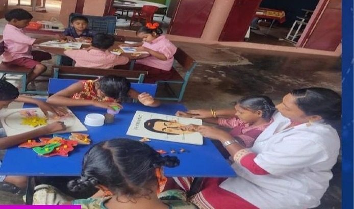 Children in a group learning activity at SRC